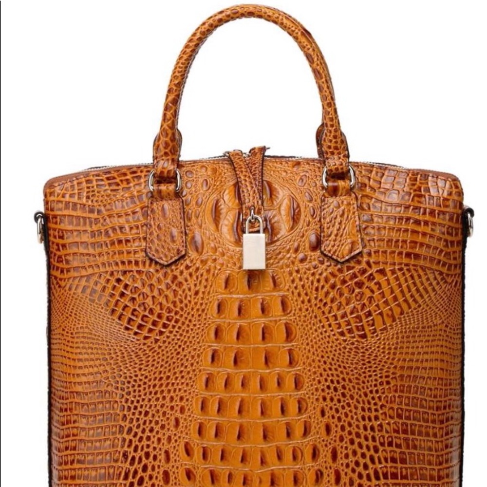 Almost New embossed leather tote bag
